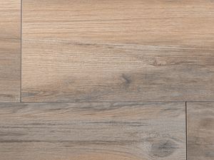 Gros plan sur le dallage imitation bois Canada Lodge, en grès cérame à l'effet rustique