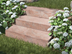 Blocs marches en gneiss Bologna avec fleurs et jardin