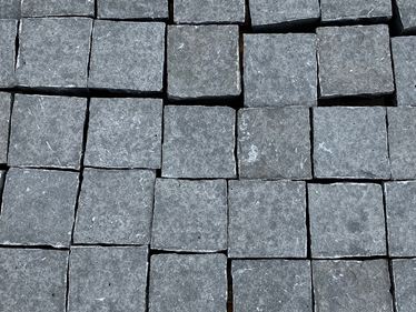Détail de la dalle de béton « Plasterstein » de Takeda – palettes vues d'en haut