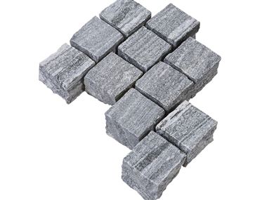 Les pavés en gneiss Urban Grey Line et un fond vide