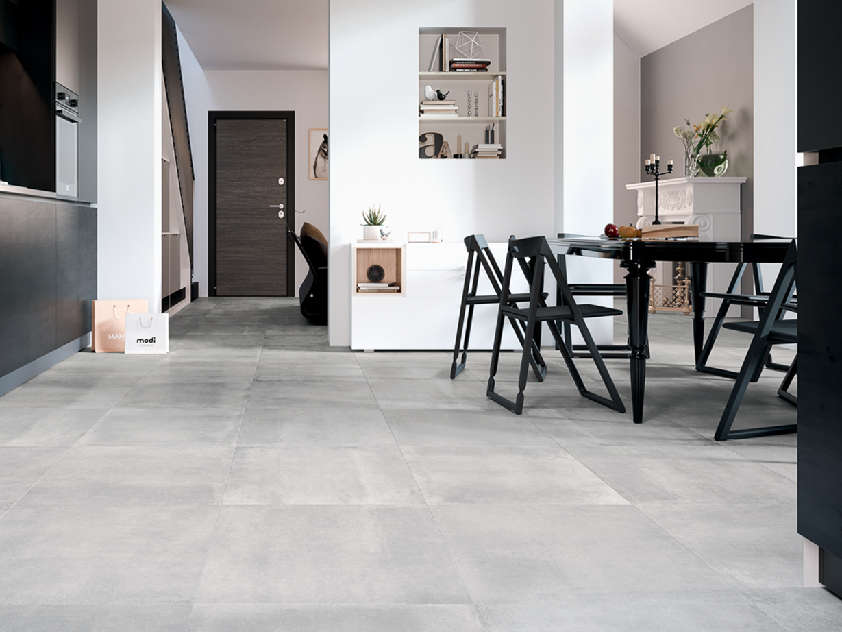 Une cuisine urbaine grâce au carrelage Pure Clay. Une cuisine dans laquelle a été posé le carrelage effet béton Pure Clay.